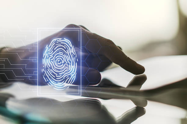 istock Multi exposure of abstract graphic fingerprint sketch and hand working with a digital tablet on background, fingerprint scan data concept 1223132095