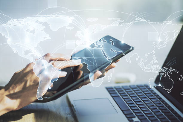 istock Abstract graphic digital world map with connections and finger presses on a digital tablet on background, globalization concept. Multiexposure 1223132147