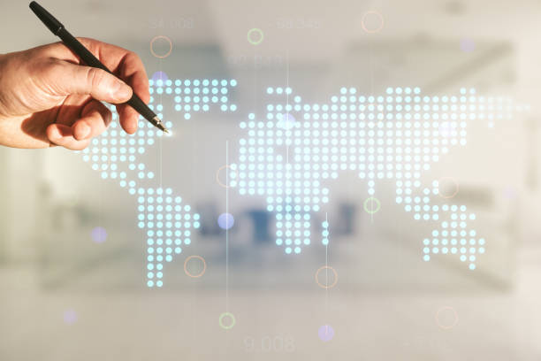 istock Multi exposure of man hand with pen working with abstract graphic world map on blurred office background, connection and communication concept 1223132876