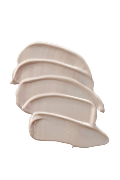 istock Texture and Stroke of Foundation Cream on a White Background 1223135331