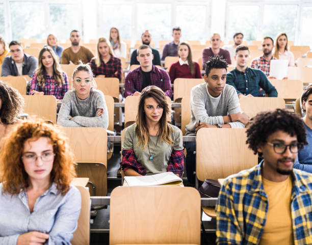 istock Large group of college students in a lecture hall. 1223135604