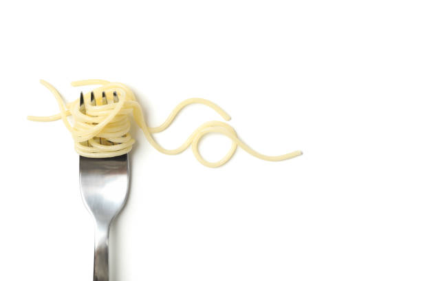 istock Fork with tasty pasta isolated on white background 1223135865