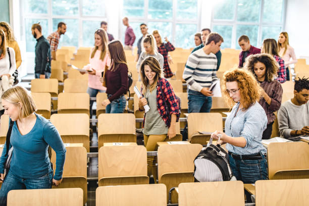 istock Large group of university students leaving the lecture hall. 1223137024
