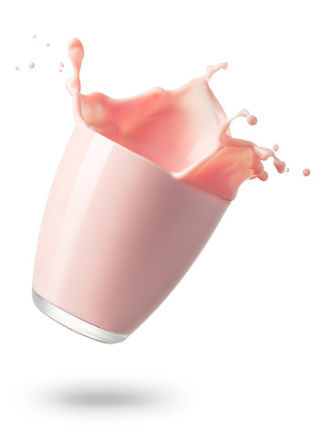 falling glass of strawberry milkshake with splash isolated on white background