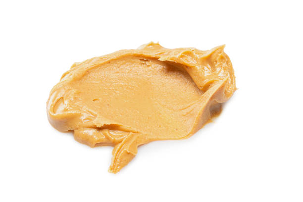 istock peanut butter isolated on white background 1223137798