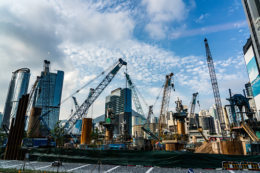 Cranes on a construction site near \nKai Tak, Hong Kong.