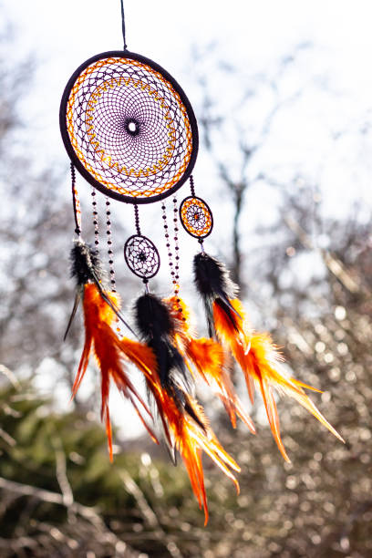 istock Handmade dream catcher with feathers threads and beads rope hanging 1223140960