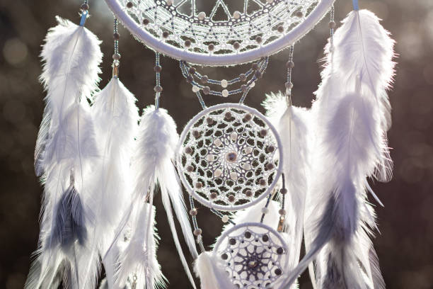istock Handmade dream catcher with feathers threads and beads rope hanging 1223140972