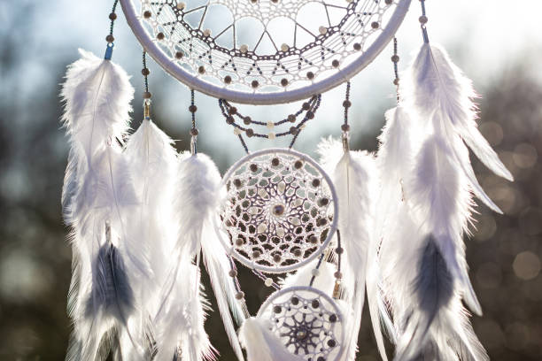 istock Handmade dream catcher with feathers threads and beads rope hanging 1223140990