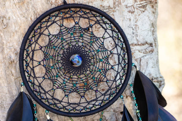 istock Handmade dream catcher with feathers threads and beads rope hanging 1223141036