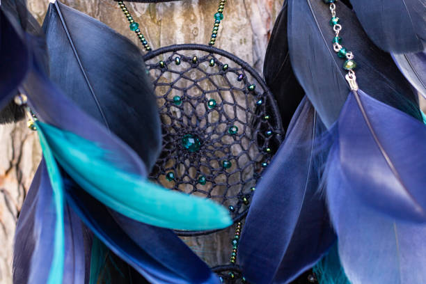 istock Handmade dream catcher with feathers threads and beads rope hanging 1223141047