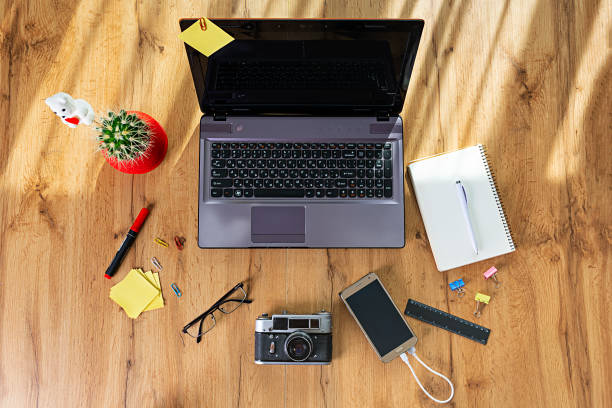 istock Workplace with notebook laptop at home. Workplace at pandemic coronavirus quarantine concept. 1223141084