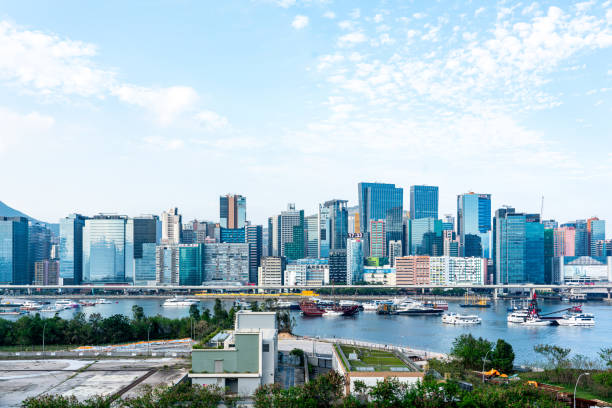 kwun tong city skyline in hong kong - glass architecture prosperity business stock-fotos und bilder