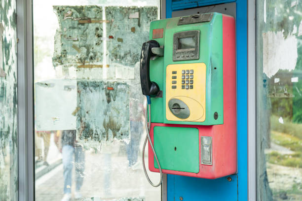 istock telephone in dirty phone booth 1223142061