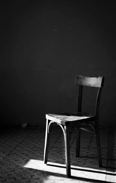 istock Vintage abandoned chair in black & white 1223144950