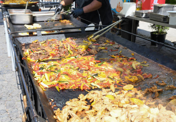 istock The process of preparing a quesadilla, traditional Mexican dish. Outdoor outside setting 1223147078