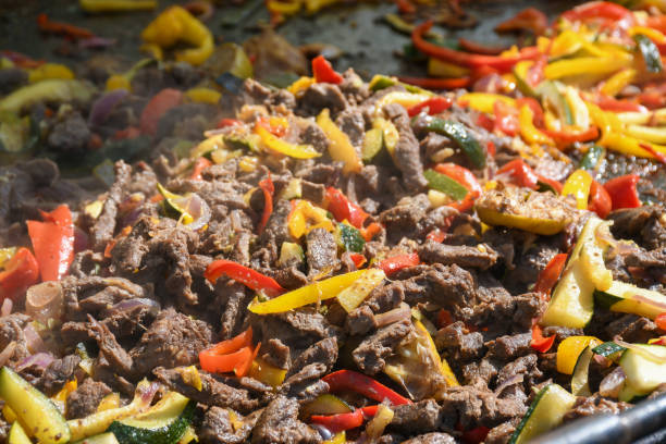 istock The process of preparing a quesadilla, traditional Mexican dish. Outdoor outside setting 1223149055