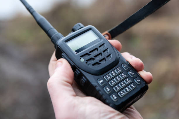 istock Male holding walkie talkie. 1223153604