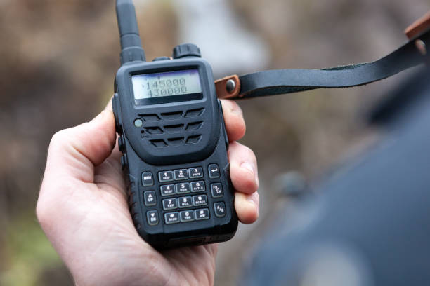 istock Male holding walkie talkie. 1223153609