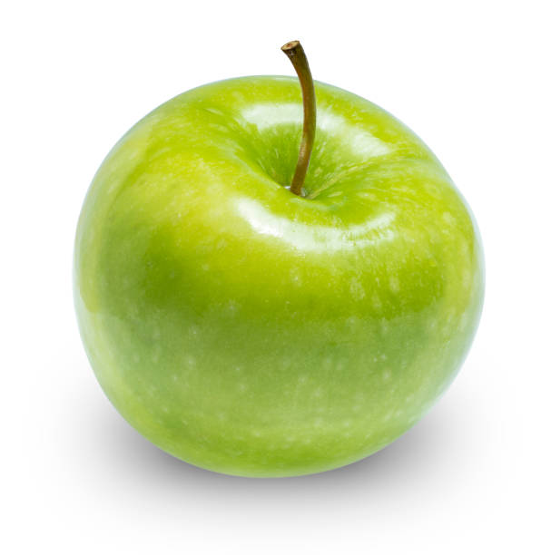 mela verde isolata su sfondo bianco, mele verdi isolate su sfondo bianco in piena profondità di campo con percorso di ritaglio - half full apple green fruit foto e immagini stock