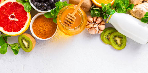 istock Healthy products for Immunity boosting on white background with copy space top view. Vegetables and fruits to boost immune system 1223154969