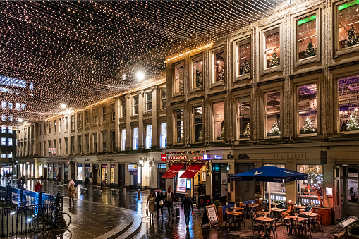 Christmas decorations in Royal Exchange Square, a public square in the Glasgow city centre. People.
