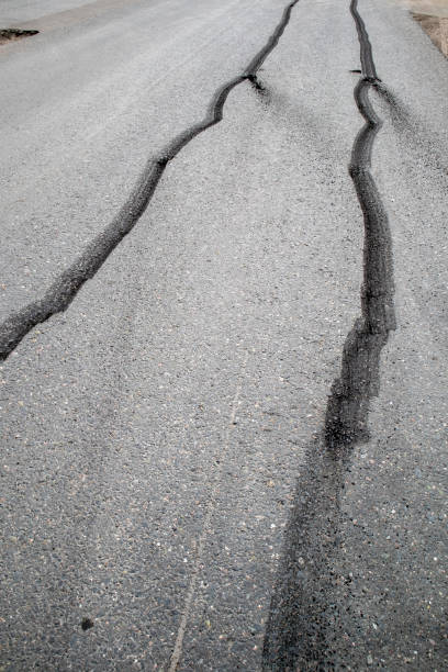 istock car tyre skid marks on road 1223158453