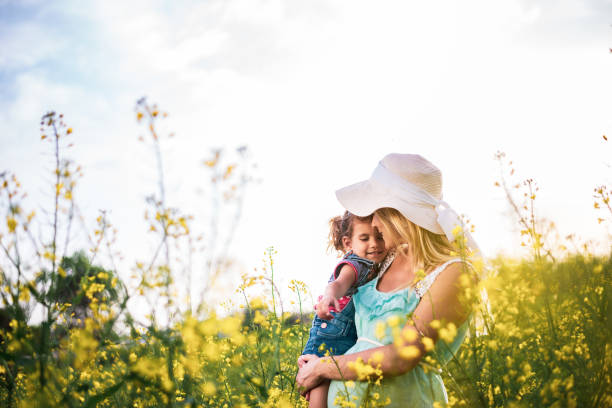 istock Young mother and daughter enjoying nature 1223159620