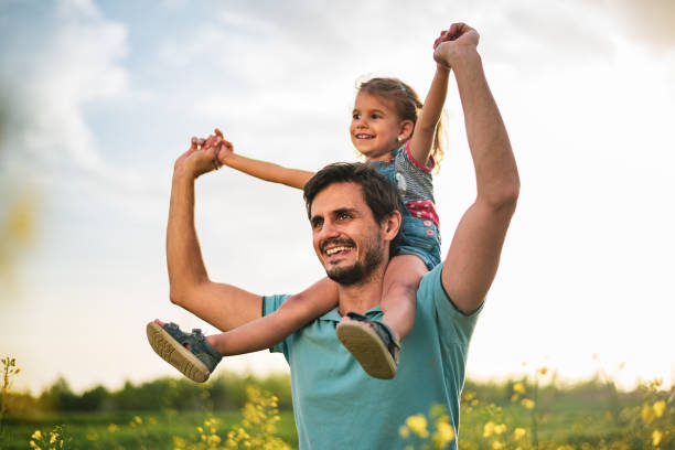 istock Father and daughter enjoying nature 1223161240