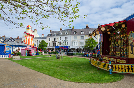 Llandudno, UK : May 6, 2019: A sunny morning sees few visitors to the street fair and entertainment stalls at the Llandudno Victorian Extravaganza