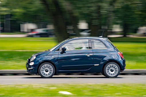 Zagreb, Croatia - June 5, 2018: Man is driving fast Fiat 500 Dolce 10 on a road. Dolce 10 is specially equipped version for the 10th birthday of reviving Fiat's popular city car.
