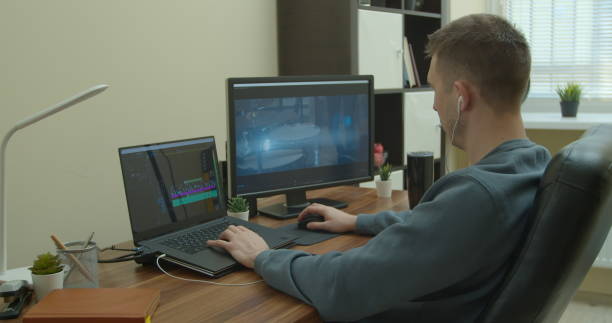 Video editing on a computer with Two Monitors. Monitor the computer and capture the work of the program for video editing.