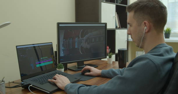 istock Video editing on a computer with Two Monitors. Monitor the computer and capture the work of the program for video editing. 1223166067