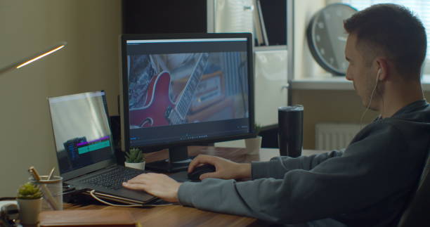 istock Video editing on a computer with Two Monitors. Monitor the computer and capture the work of the program for video editing. 1223166139