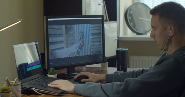 istock Video editing on a computer with Two Monitors. Monitor the computer and capture the work of the program for video editing. 1223166149