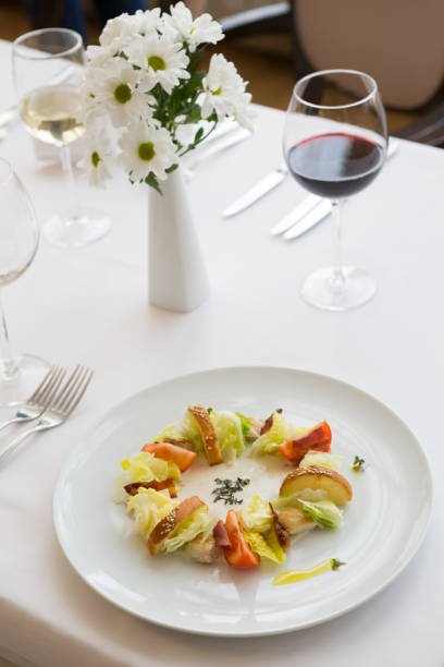 istock Ceasar salad with bacon served on a white plate 1223168964