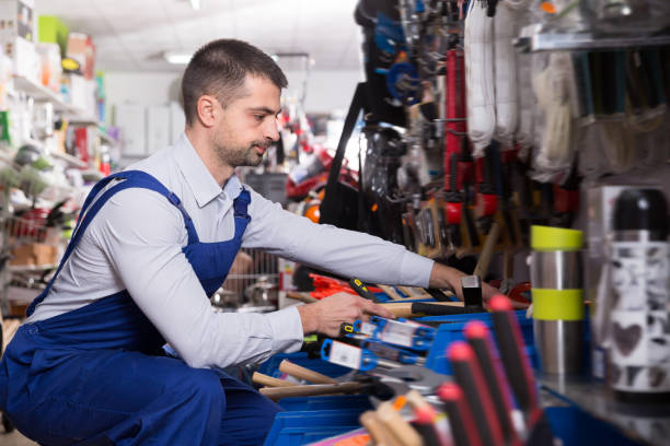 istock Ordinary man is buying new hammer 1223170932