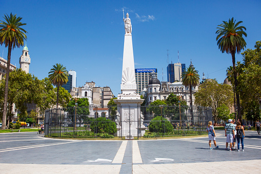 Buenos Aires, Argentina-February 29, 2020:  Plaza de Mayo. The Piramide de Mayo.\n  Piramide de Mayo  is the main symbol of Plaza de Mayo square, located in the very center of it. The monument was built at the beginning of the XIX century, in honor of the anniversary of the revolution of 1810, and over the years of its existence, several times succumbed to reconstruction. Today, the top of the pyramid is crowned by a statue of a woman who represents an independent Argentina.