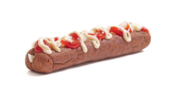 One frikadel with ketchup, mayonnaise on chopped onions, a Dutch fast food snack called 'frikadel speciaal', the Netherlands One frikadel with ketchup, mayonnaise on chopped onions, a Dutch fast food snack called 'frikadel speciaal', the Netherlands frikandel speciaal stock pictures, royalty-free photos & images