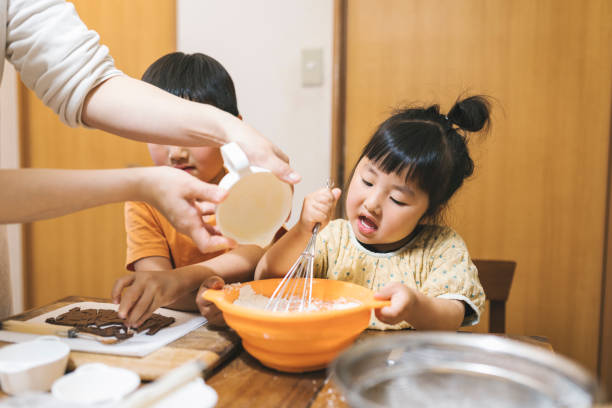 istock Family making cookies at home 1223174539