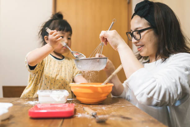 istock Family making cookies at home 1223174542
