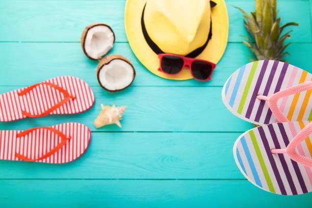 istock Beach accessories on blue wooden floor. Top view and selective focus 1223174826