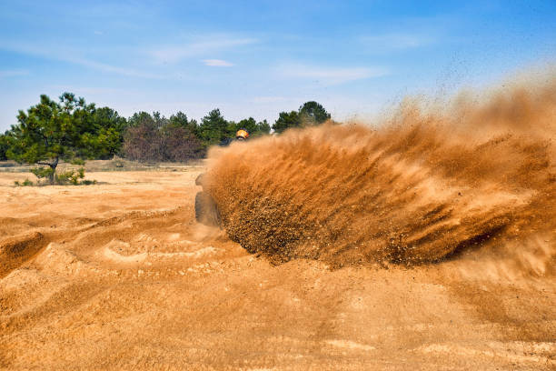 istock Racing in the sand on a four-wheel drive quad. 1223175048
