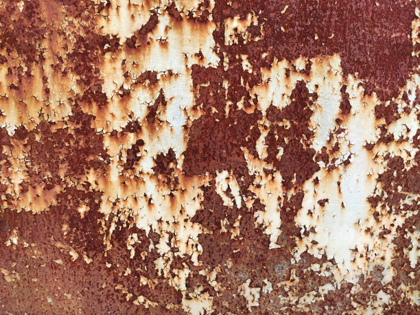 istock Rusty metal panel with cracked paint, corroded grunge metal background 1223178426