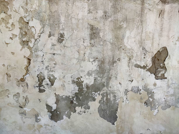 istock Grey Concrete Texture old wall with peeling paint, scratches and cracks 1223178459