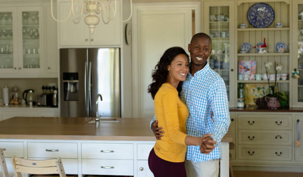 istock Happy couple dancing in their kitchen 1223180388