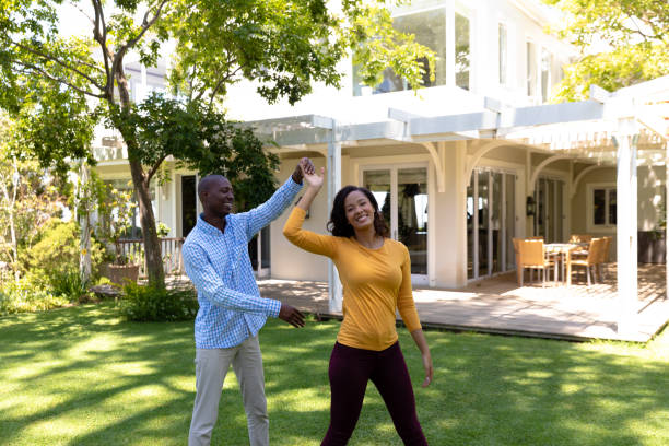 Happy couple dancing in the garden