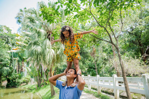 istock Young father in nature holding his daughter 1223187287
