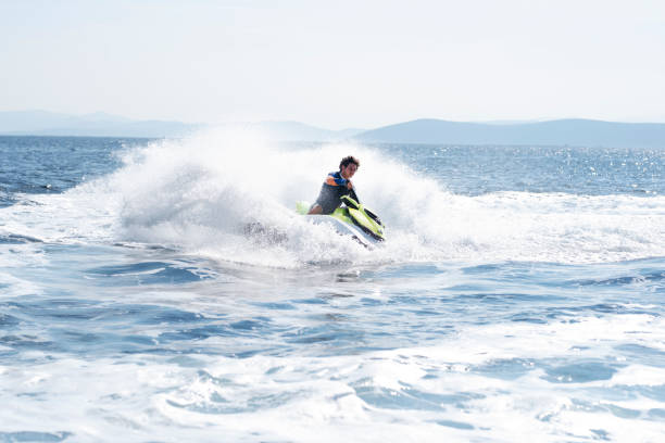 istock Jet ski on turquoise sea on a blue day 1223187648