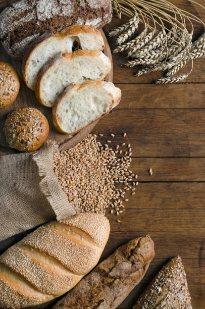 istock Assortment bread products on wooden table 1223189429